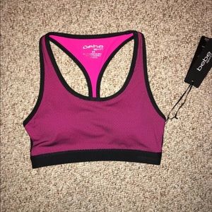Pink and black sports bra